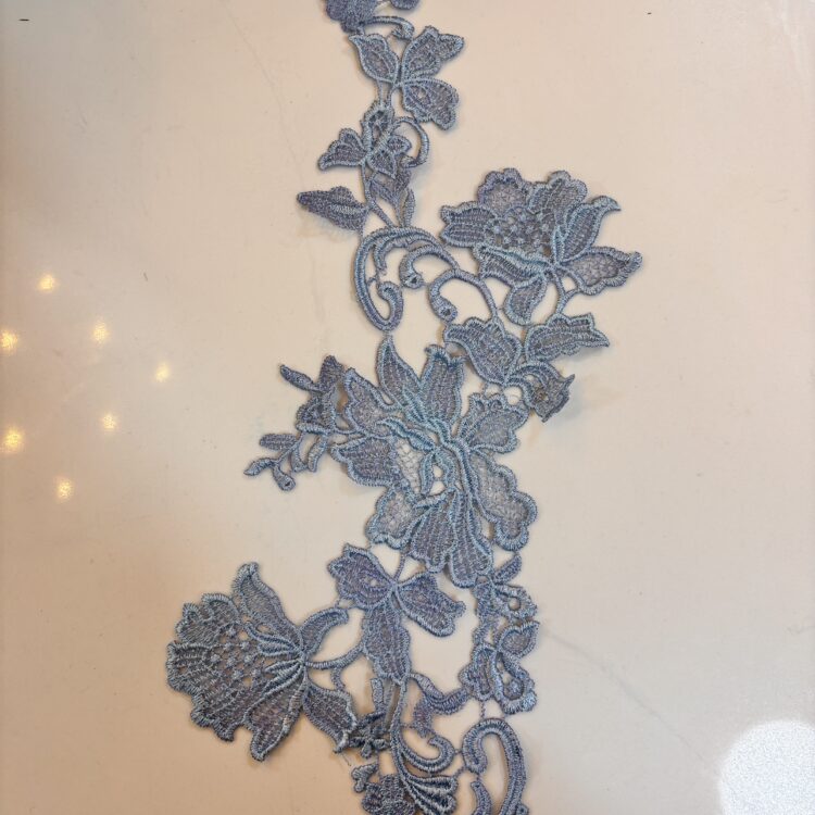 Two-tone cornflower blue Applique. 13" x 4.5"